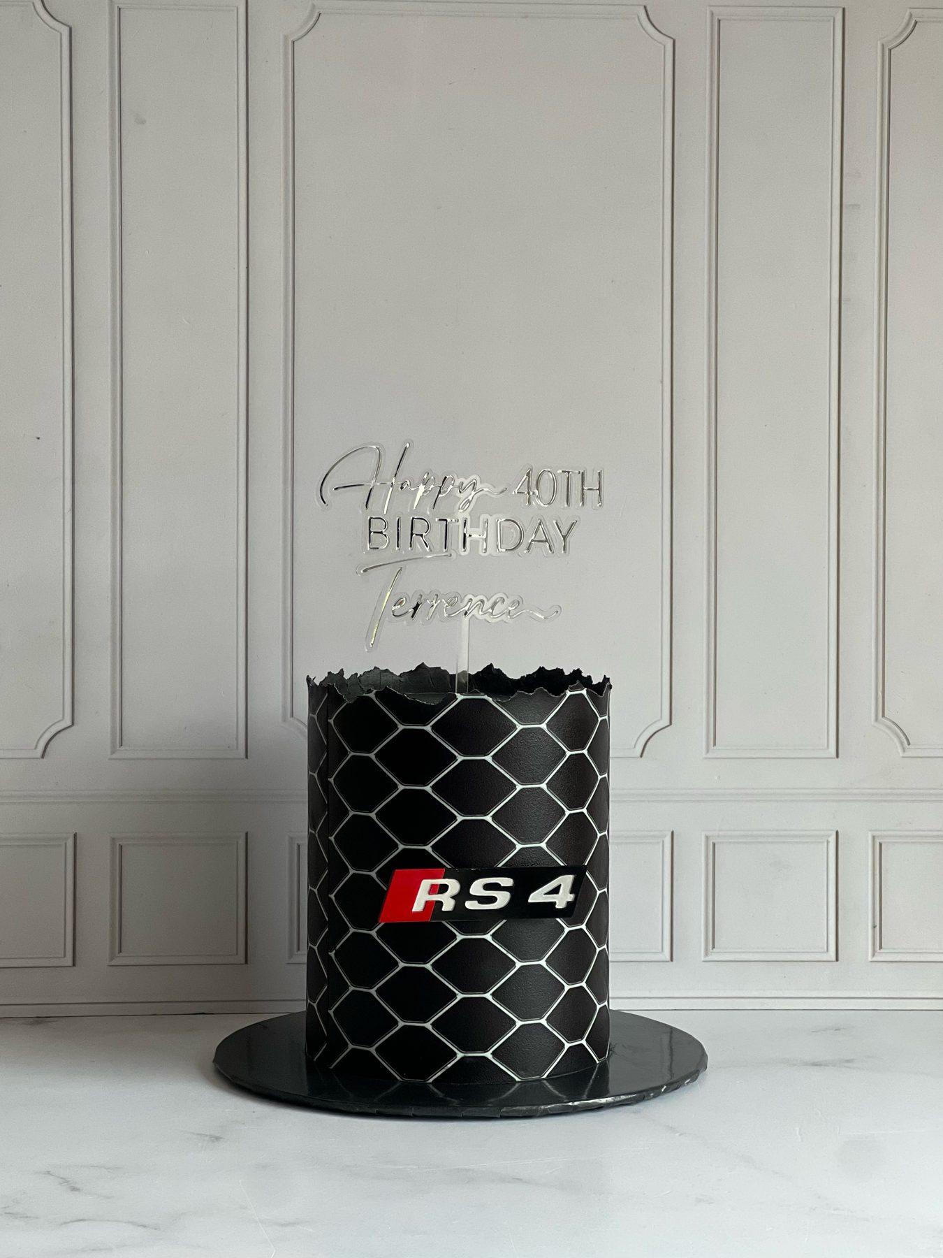 40th birthday cake decorated with a racing livery design