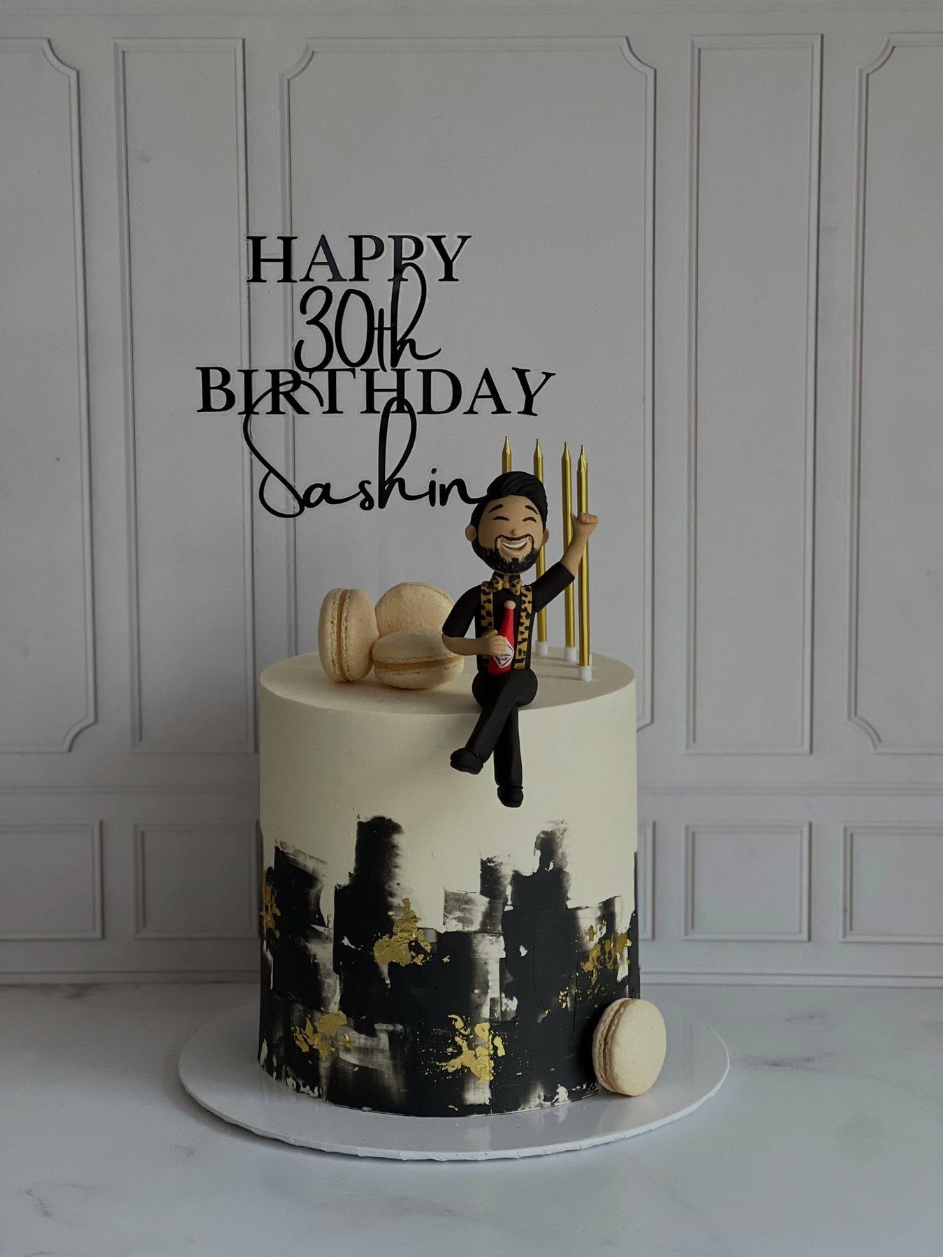 30th birthday cake with a city skyline design